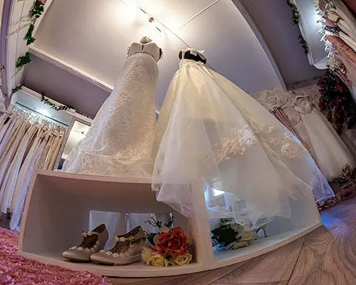 some bridal dresses on display at bridal treasures boutique